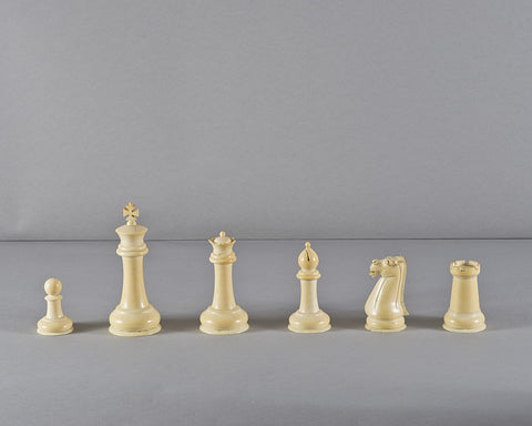 A Chinese Staunton Ivory Chess Set and Board