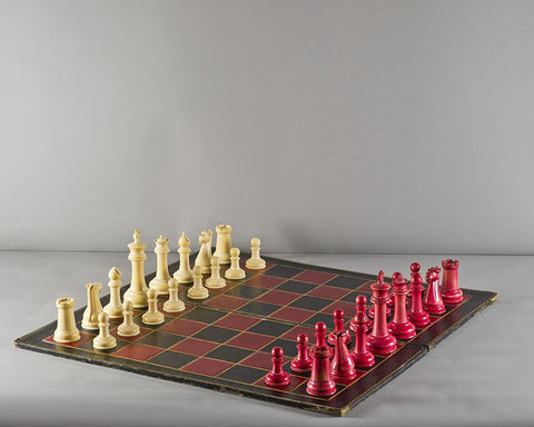A Chinese Staunton Ivory Chess Set and Board